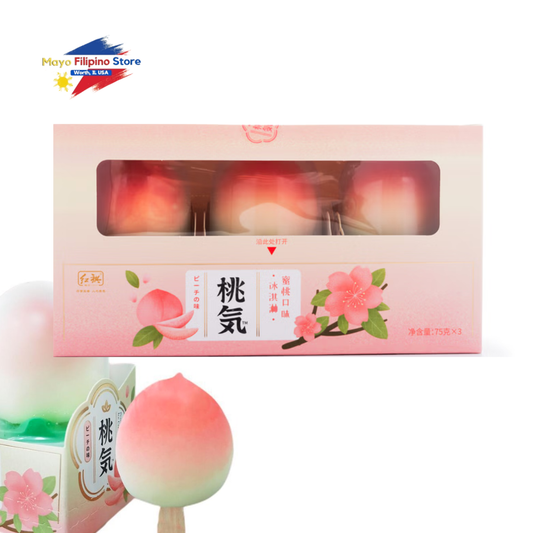 Peach-shaped ice cream on a stick with packaging featuring floral design and brand logo.